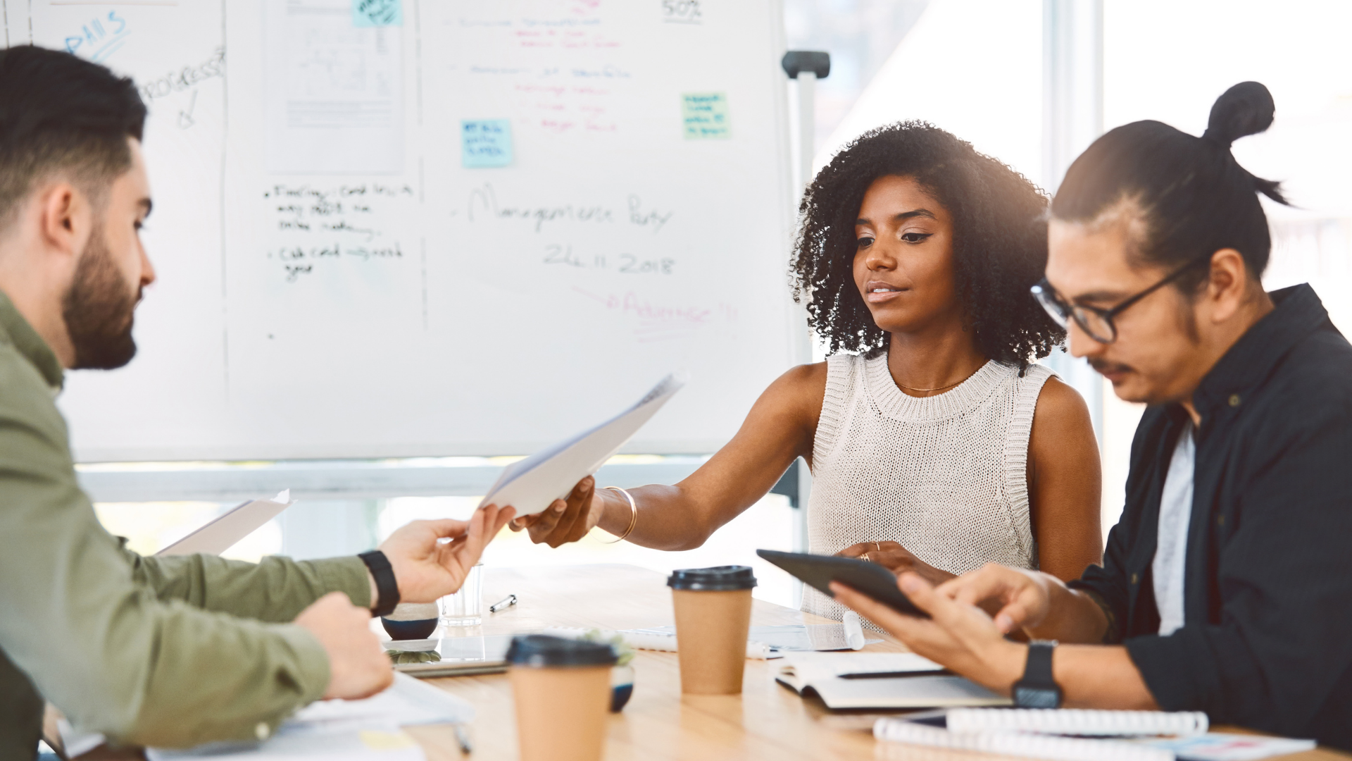 Digital marketing team collaborating to ptimize strategy based on insights surfaced from Quid's ecommerce trend analysis.